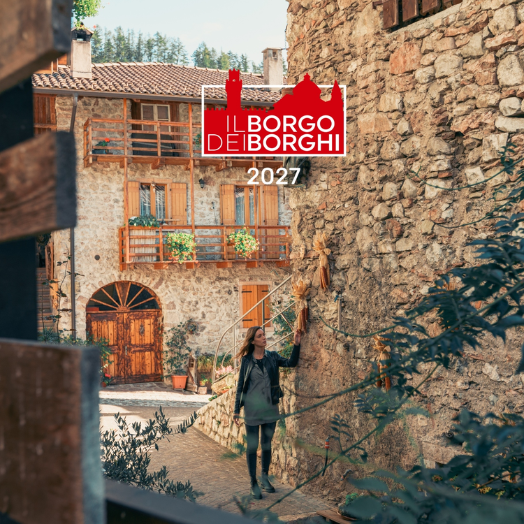 The village of San Lorenzo in Banale in autumn during the Ciuìga Festival, celebrating our traditional cured meat made with turnips.